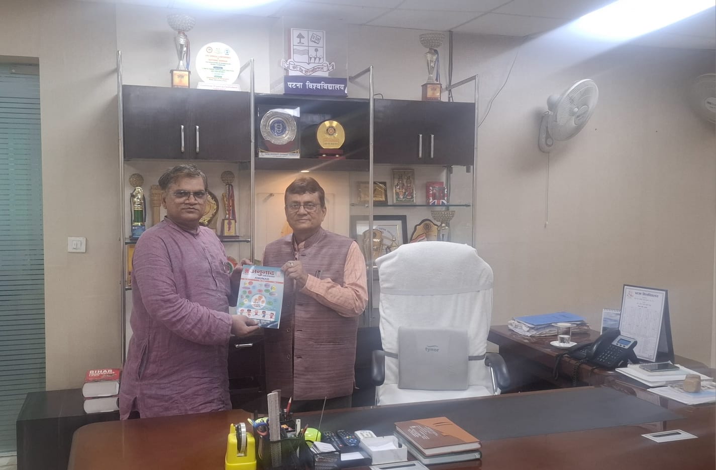 Principal Presented Copy of ANUNAD  to Hon'ble VC